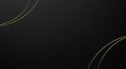 Elegant dark textured background with graceful curving gold lines