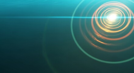 Abstract bright lens flare with radiant rings and blue-green