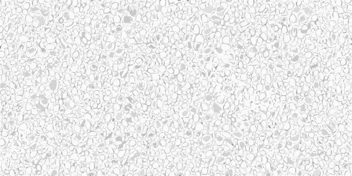 A full frame view of small white and gray pebbles covering the surface