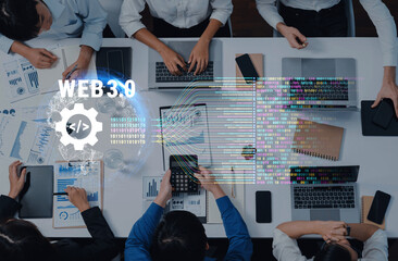 A diverse group of professionals collaborates on Web 3.0 projects in a modern workspace, utilizing laptops, charts, and digital data for innovative solutions. Trope