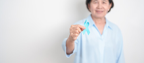 Elderly with blue Ribbon for Prostate Cancer Awareness month, April Child Abuse Prevention, National Bullying, September Addiction Recovery, May Chronic Fatigue Syndrome and January Human Trafficking