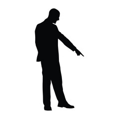 Silhouette of a Businessman Standing in a Suit, Pointing His Finger Downwards to Indicate Direction or Draw Attention