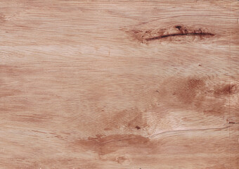 Natural wood grain texture background with light brown color and visible knot details.
