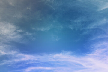 Beautiful sunset sky above clouds with dramatic light. Cabin view from airplane