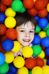 Children spend time in the play center. Preschoolers indulge in a children's center.