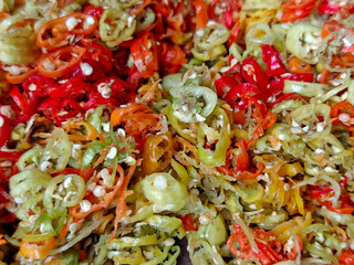 Colorful Sliced Chili Peppers Background – Spicy Food Texture