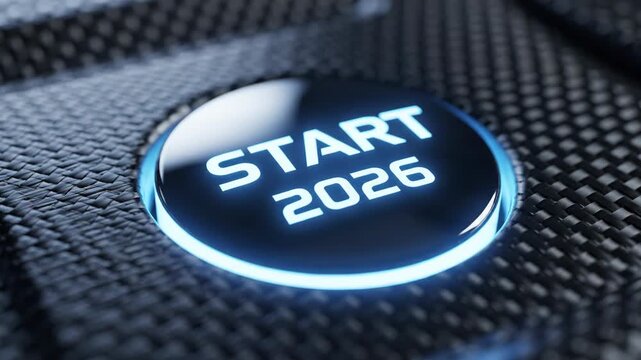 Modern Start Button with Year Display - This close-up video showcases a glossy circular button featuring the word "START" and the year "2026" illuminated with a soft blue glow.