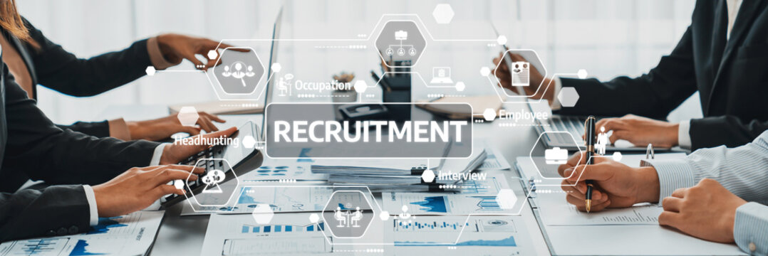 A dynamic recruitment scene featuring professionals collaborating in a modern office. The image highlights technology-driven hiring practices and interview processes. Amity