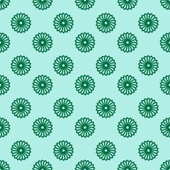 Geometric floral seamless pattern with dark green abstract sunburst mandala flowers on a light mint background. Ideal for textile, fabric, wrapping, wallpaper, and background.