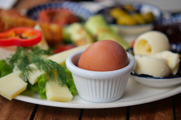 Breakfast with eggs, cheese, and veggies