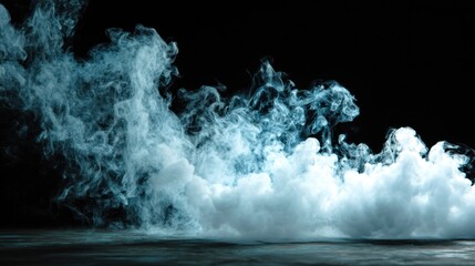 Dense swirling smoke forms fascinating shapes against a black background creating a mysterious and captivating scene. The movement of the smoke evokes a sense of intrigue and wonder.