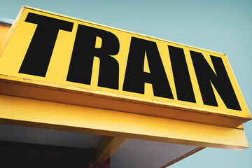 Old worn train station sign