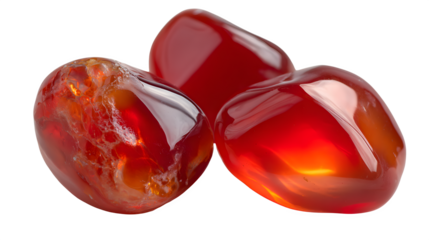Three polished carnelian gemstones display deep fiery red and orange hues against a