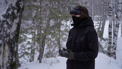 FPV drone operator, close-up, face with glasses
