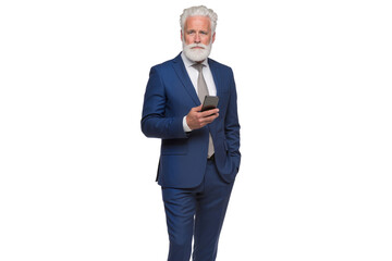 Senior businessman in a blue suit holding a smartphone, looking confidently at the camera, isolated on transparent background, png