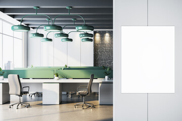 Plakat Modern office interior with empty vertical poster frame on clean wall near workstations and green lamps in bright corporate workspace. 3D Rendering