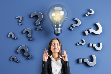 Woman brainstorming with lightbulb and question marks symbolizing creative problem solving and innovative business ideas on blue background.