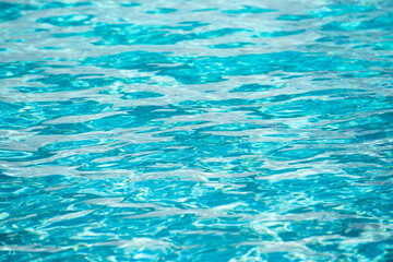 Obraz premium Ripped water in swimming pool. Surface of blue swimming pool, background of water.