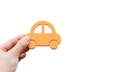 Hand holding orange paper car icon representing auto insurance, vehicle protection and safety concept, isolated on a transparent background, png