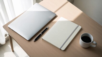 Minimalist Work Desk Setup with Laptop, White Notebook, Pen, and Coffee Mug Under Natural Sunlight for Remote Professional Productivity and Calm Aesthetics.