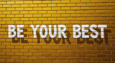 Fototapeta premium Inspiring Graffiti Art on Textured Yellow Brick Wall: Encouragement to Be Your Best Self
