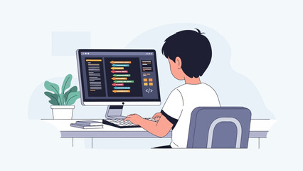 Young boy coding on a computer, learning computer programming and digital skills for future success