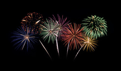 Festive colorful fireworks display isolated on black background for celebration and anniversary