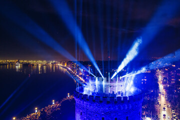New Year&rsquo;s Eve Gathering Around Thessaloniki White Tower with Festive Lights and Urban Energy
