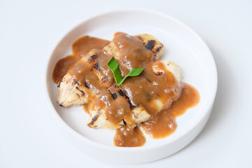 Pisang gapit or pisang epe, grilled banana with palm sugar sauce, Indonesian traditional food.