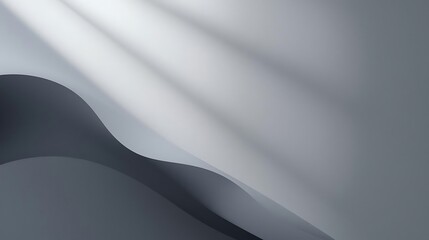 Elegant grey curves with gentle light rays creating a serene and sophisticated abstract background texture, perfect for modern design projects and digital presentations