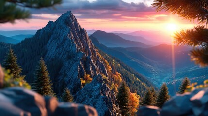 Sunset over mountain landscape with rugged peak and trees