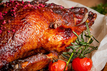 Succulent duck glistens with glaze, herbs, and bright tomatoes, perfect for a gathering