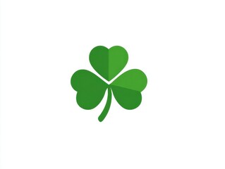 A vibrant, simple graphic featuring a three-leaf clover, rendered in shades of green. The clover sits isolated against a clean white background