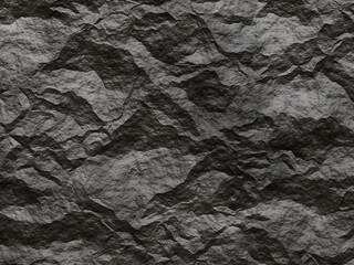 Abstract rock texture with dark contrasts and deep folds.