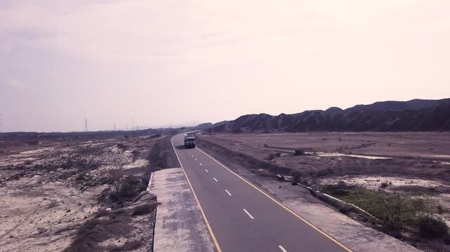 Drone Shot of Passing Truck on Makran Coastal Highway, Balochistan, Pakistan