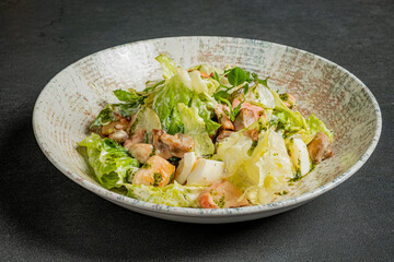 Crisp lettuce and vibrant toppings create a delicious salad, perfect for a healthy meal at any time