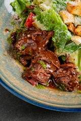 Grilled steak with a fresh garden salad and tasty dressing makes a delightful meal