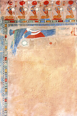 Vertical background with Ancient Egyptian Colorful Mural Wall Painting and stucco wall texture. Frame in egyptian style with Figure of eagle and cobras. Mock up template. Copy space for text