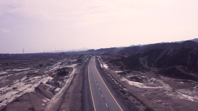 Passing Truck on Makran Coastal Highway, Balochistan Aerial Drone Shot, Pakistan