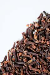 Close-up of dry clove buds isolated on white background