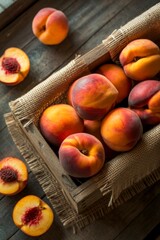 Freshly harvested peaches in a rustic wooden crate