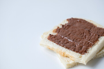 Close-up of white bread with chocolate jam