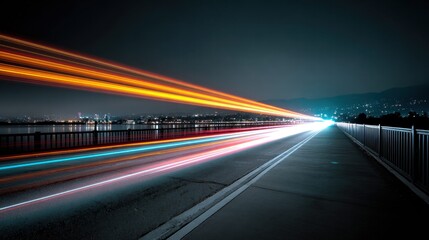 Obraz premium Nighttime city bridge with light trails