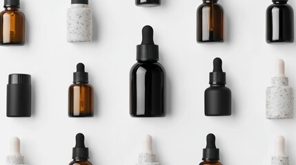 Variety of dropper bottles on a white background.