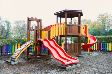 Bright and cheerful playground structure invites children to explore and play on a sunny day in a vibrant neighborhood park