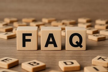 FAQ Blocks: Wooden blocks spell out the acronym FAQ, surrounded by other letter blocks, conveying a sense of helpfulness and information access.