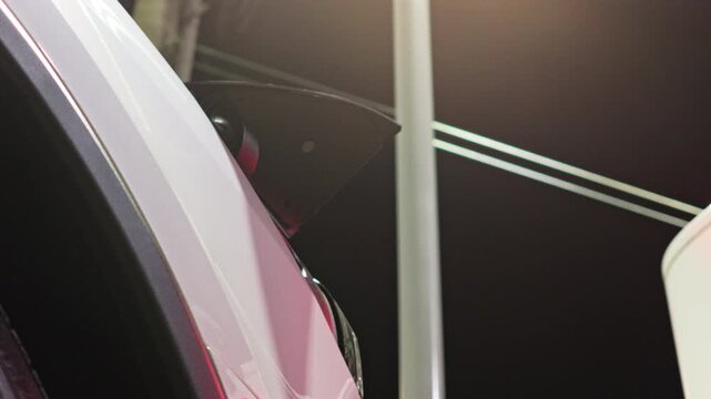 Charging an EV at a Supercharger