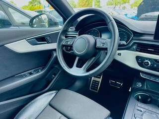 Driving experience captured in a modern car interior with sleek design and advanced technology