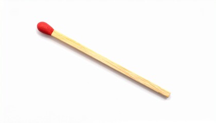 Obraz premium Single wooden matchstick with red tip on white background, unused, minimal and isolated.