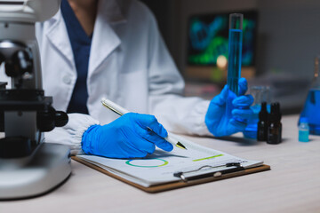 Scientist analyzing data and developing scientific solution